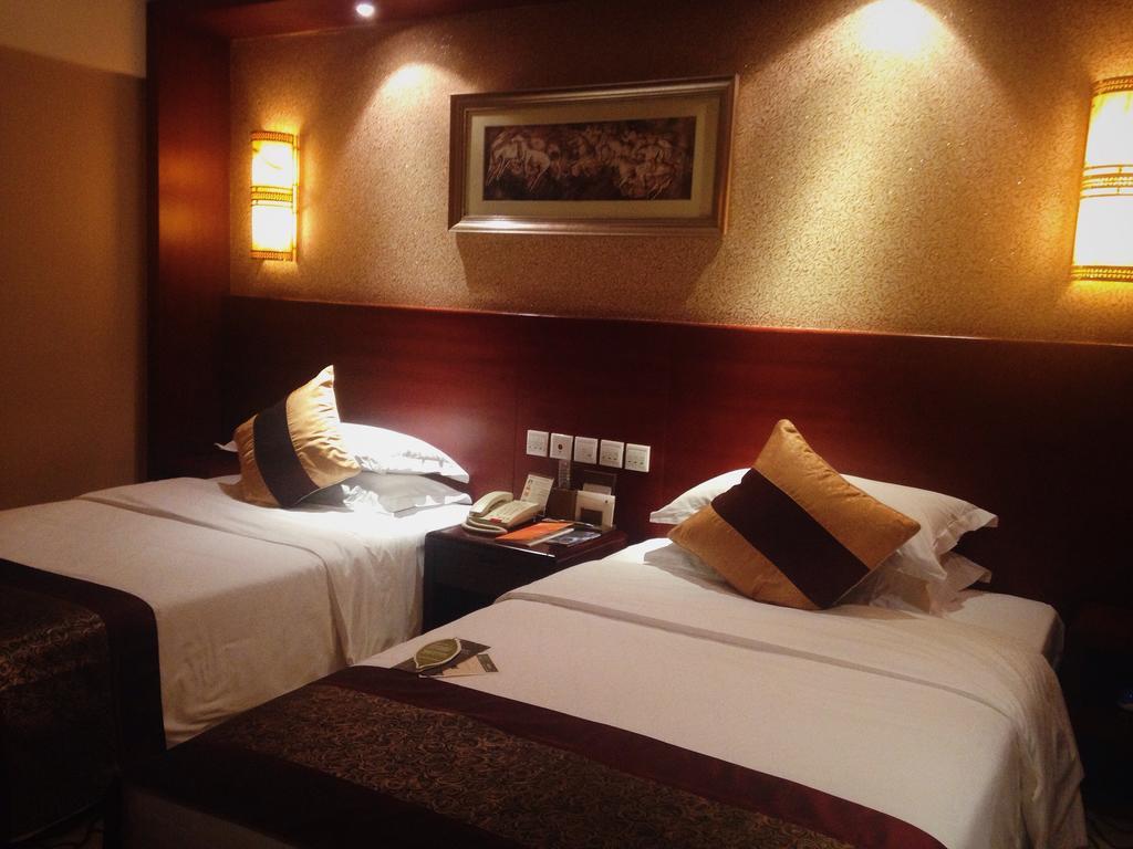 Dynasty International Hotel Kunming Quarto foto
