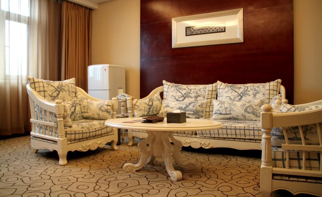 Dynasty International Hotel Kunming Quarto foto